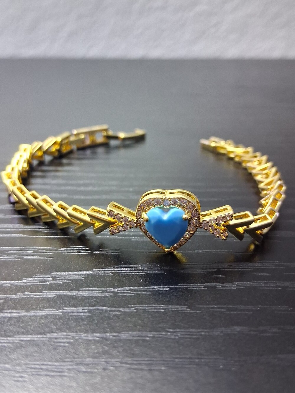 Gorgeous Gold Tennis Bracelet with Blue Heart Accent